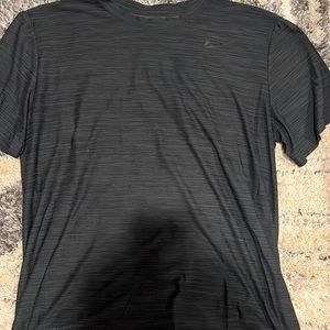 Nike black Dri fit t shirt.